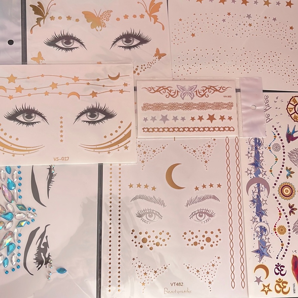 bundle of temporary face tattoos and gems